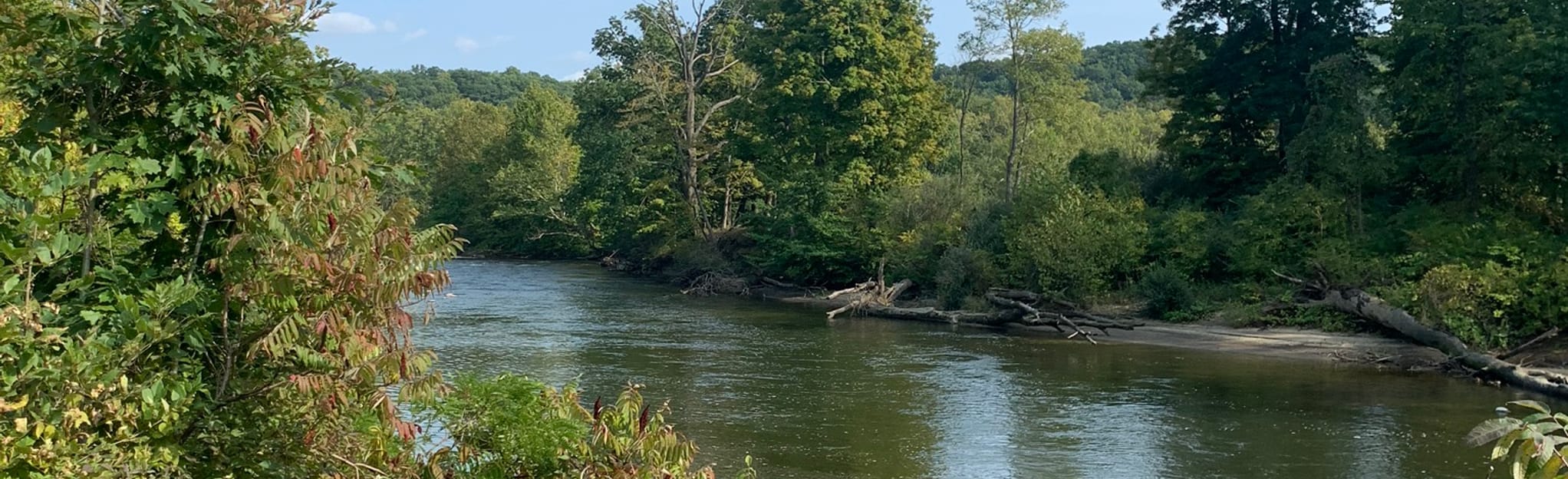 Ohio and Erie Canal Towpath Red - EyJidWNrZXQiOiJhc3NldHMuYWxsdHJhaWxzLmNvbSIsImtleSI6InVwbG9hZHMvcGhvdG8vaW1hZ2UvMjk4NTk4MDYvYWNlM2M2ZWNiOTIwZWRjOTllMDUzNmMyMmQ0YjQwYTcuanBnIiwiZWRpdHMiOnsidG9Gb3JtYXQiOiJqcGVnIiwicmVzaXplIjp7IndpZHRoIjoyMDQ0LCJoZWlnaHQiOjYyNCwiZml0IjoiY292ZXIifSwicm90YXRlIjpudWxsLCJqcGVnIjp7InRyZWxsaXNRdWFudGlzYXRpb24iOnRydWUsIm92ZXJzaG9vdERlcmluZ2luZyI6dHJ1ZSwib3B0aW1pc2VTY2FucyI6dHJ1ZSwicXVhbnRpc2F0aW9uVGFibGUiOjN9fX0=