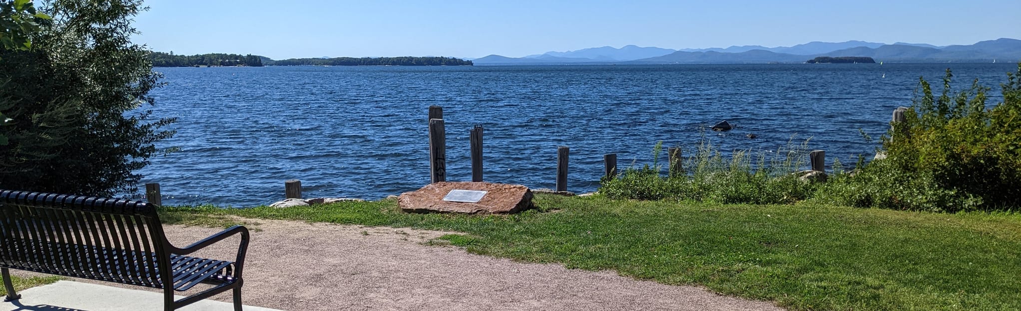 Burlington Bike Path Vermont - EyJidWNrZXQiOiJhc3NldHMuYWxsdHJhaWxzLmNvbSIsImtleSI6InVwbG9hZHMvcGhvdG8vaW1hZ2UvNTE2MjgwNzQvNGFiZDk4YmUzNzgyNTc4NGFlYTliZGQxZjU5Mzg2MmIuanBnIiwiZWRpdHMiOnsidG9Gb3JtYXQiOiJqcGVnIiwicmVzaXplIjp7IndpZHRoIjoyMDQ0LCJoZWlnaHQiOjYyNCwiZml0IjoiY292ZXIifSwicm90YXRlIjpudWxsLCJqcGVnIjp7InRyZWxsaXNRdWFudGlzYXRpb24iOnRydWUsIm92ZXJzaG9vdERlcmluZ2luZyI6dHJ1ZSwib3B0aW1pc2VTY2FucyI6dHJ1ZSwicXVhbnRpc2F0aW9uVGFibGUiOjN9fX0=